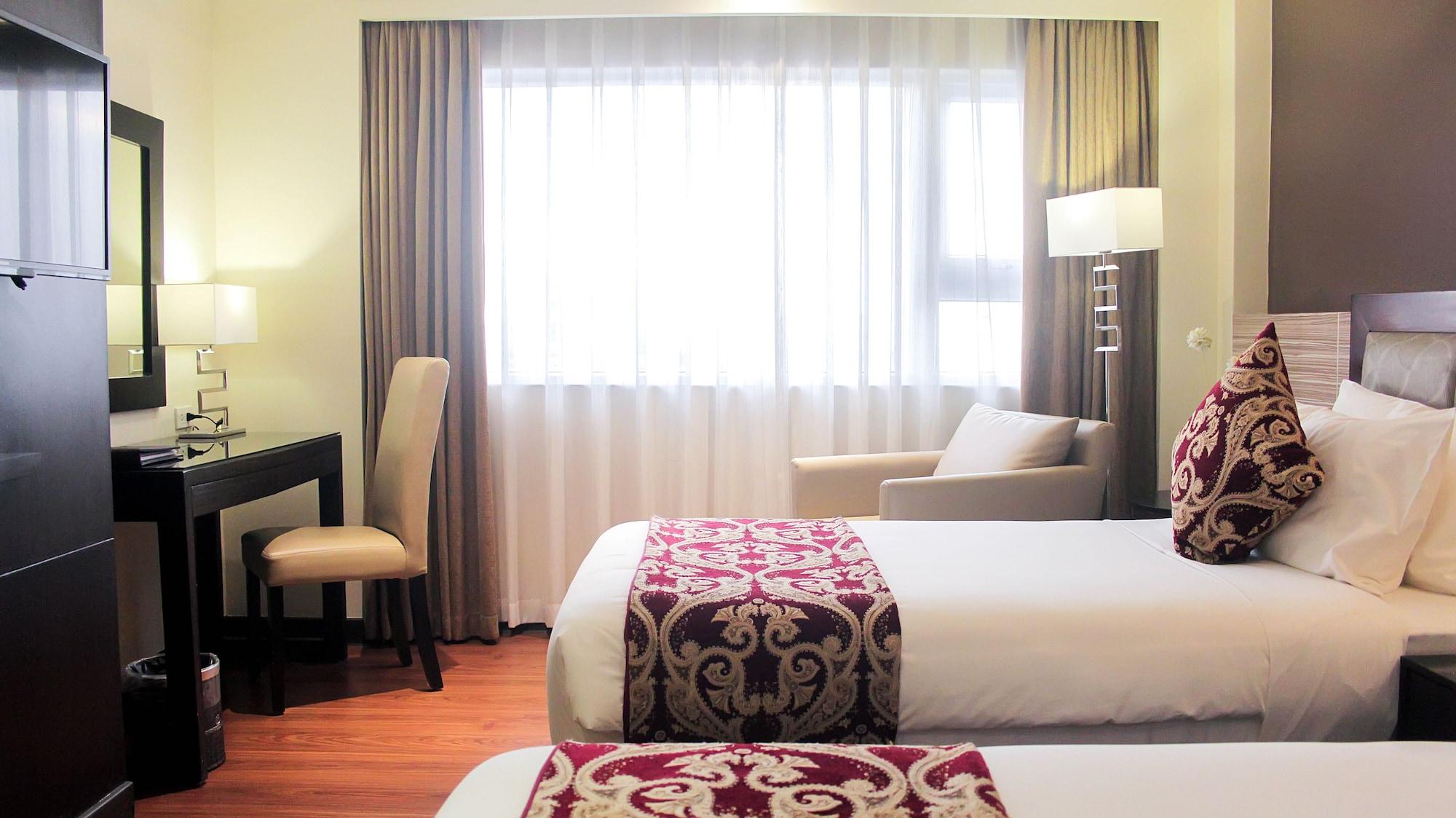 קואזון סיטי Brentwood Suites מראה חיצוני תמונה